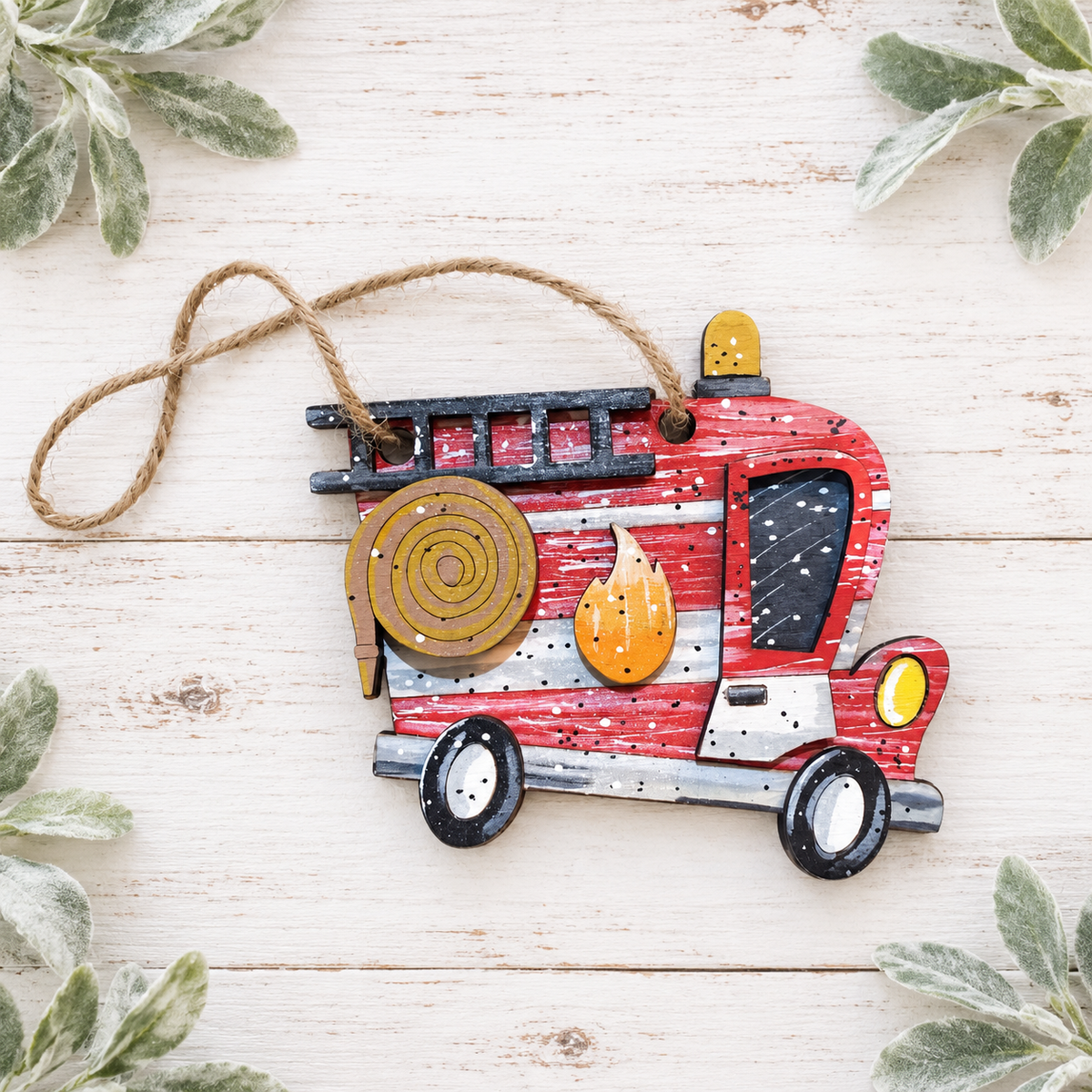 Hand-painted red firetruck ornament with ladder, hose and flame