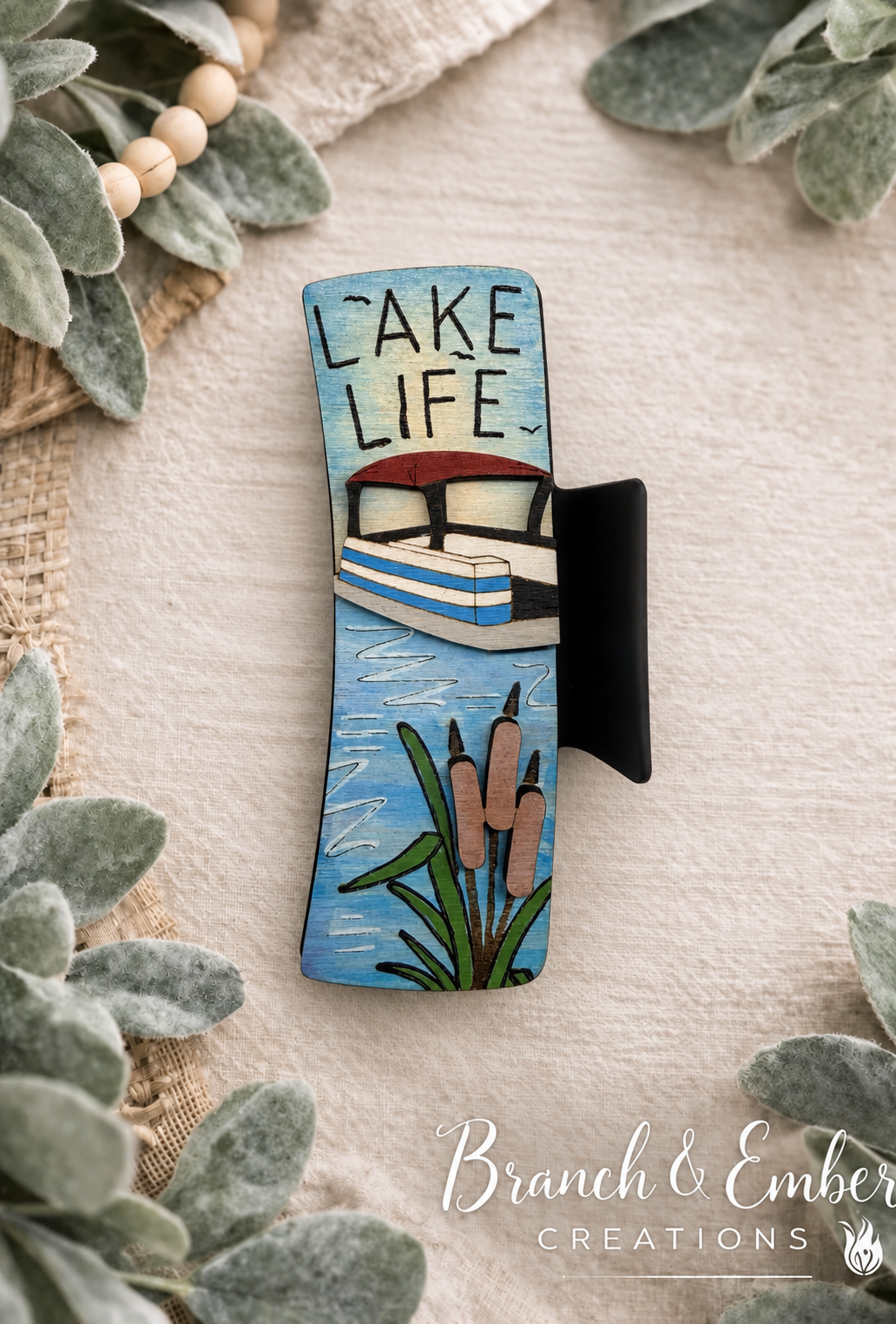 Hand-painted Lake Life 4-inch wooden hair claw clip with pontoon boat and cattails