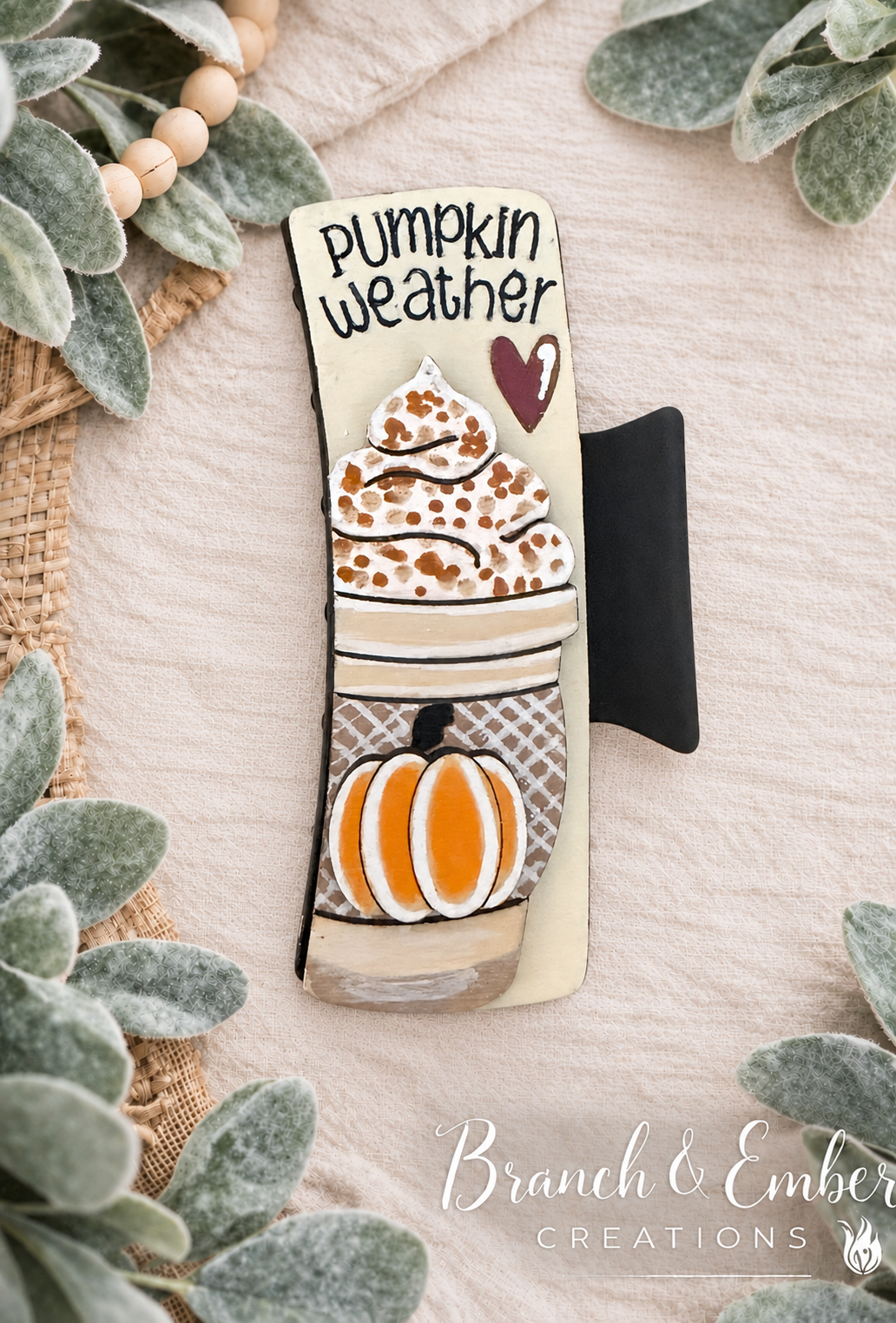 Hand-painted Pumpkin Weather wooden hair claw clip with coffee cup and pumpkin on linen and lamb’s ear backdrop