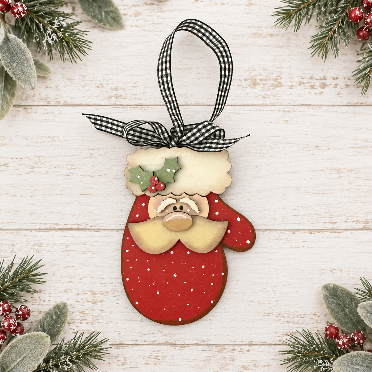 Hand-painted Santa ornament with holly and black-and-white gingham ribbon